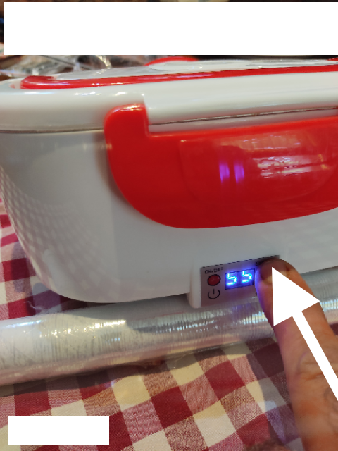 Set the temperature of the = food warmer